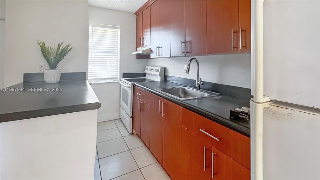 Photo of 4081 N Dixie Hwy #20, Oakland Park, FL 33334 (MLS # A11997984)