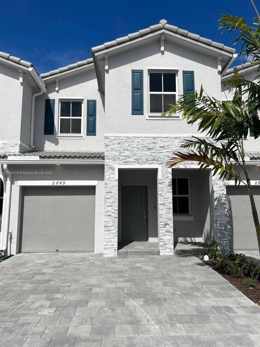 Beautiful brand-new townhouse at 2649 SE 10th St, Homestead, FL 33035! This smart home features 4 bright bedrooms, 2 full bathrooms, and 1 half bath for guests. Designed with an open floor concept, the kitchen boasts stainless steel appliances and granite countertops, flowing seamlessly into spacious living areas. Conveniently located just minutes from the Turnpike, US1, Walgreens, Publix, Baptist Hospital, banks, and more, this home offers modern living at its best. Perfect for those seeking comfort and accessibility in Homestead's vibrant community!