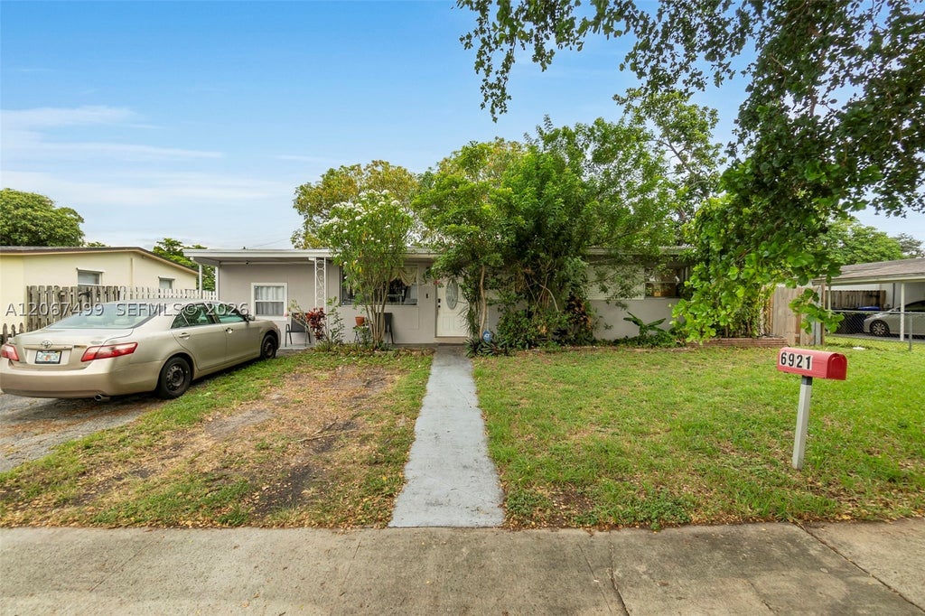 Photo of 6921 Taylor St, Hollywood, FL 33024 (MLS # A12067499)