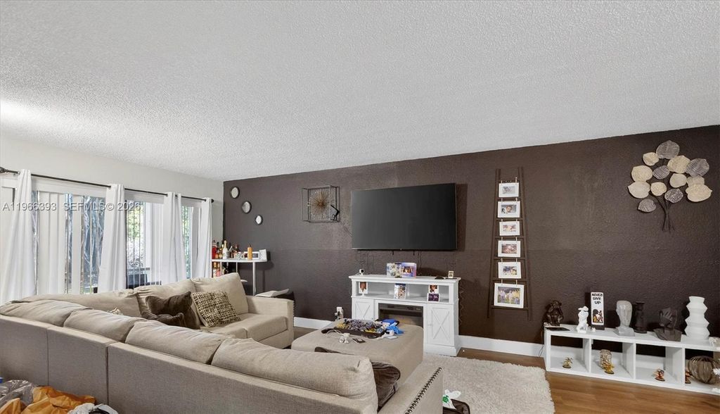 Photo of 4141 NW 21st St #103, Lauderhill, FL 33313 (MLS # A11966393)