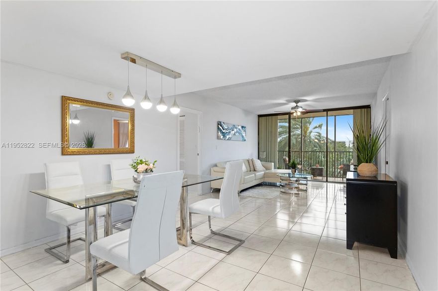 Welcome to the best priced unit in Coronado! This 2 bed, 2 bath unit has picturesque views of the Aventura Golf Course. Freshly painted allowing for the brightness and warmth to stand out. Lots of natural light pouring in from all windows. Entering the unit you are greeted by an expansive dining and living area, stretching all the way to the balcony. With the kitchen flanking to the right of the dining and living space. Both bedrooms have en suite bathrooms, and golf course views. The pool has just been re-opened, the gym has brand new equipment, all amenities are open and operating. This condo comes with 1 storage unit, 1 assigned garage parking space, and 1 unassigned guest parking space on the top deck.