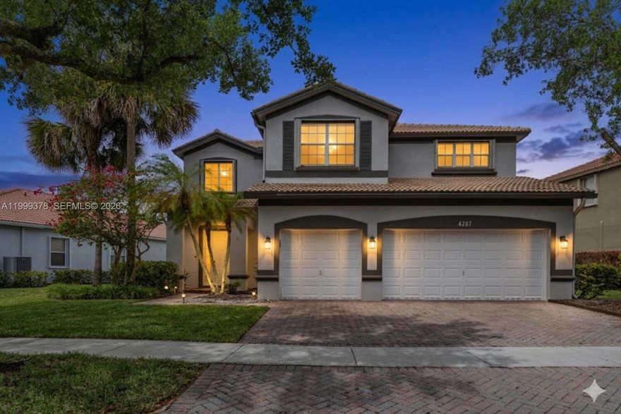 Bright and Spacious 5BR/4BA Home with over 3200sqft  and 3 Car Garage in the Coveted Community of Isles of Weston. This Carefully Thought out Floorplan offers Beautiful Volume Ceilings, Formal Living Room and Dining Room, Comfortable Family Room with Access to Screened-In Porch. Tastefully Remodeled Kitchen with Granite Countertops, Stainless Steel Appliances with Under Cabinet Lighting. First Floor Bedroom is perfect for an Office, In-Law or Guest Room. Primary Suite is the Perfect Dreamy Daily Getaway with Walk-In Closets, Spacious Walk-in Shower, Soak-in Tub and Dual Vanities. The community offers Resort-Like Living with Clubhouse, Pool, Playground, Fitness Center and Volleyball & Basketball Courts. Conveniently Located within Walking Distance to Top Rated Schools - Manatee Bay Elementary, and easy access to Falcon Cove Middle and Cypress Bay High.