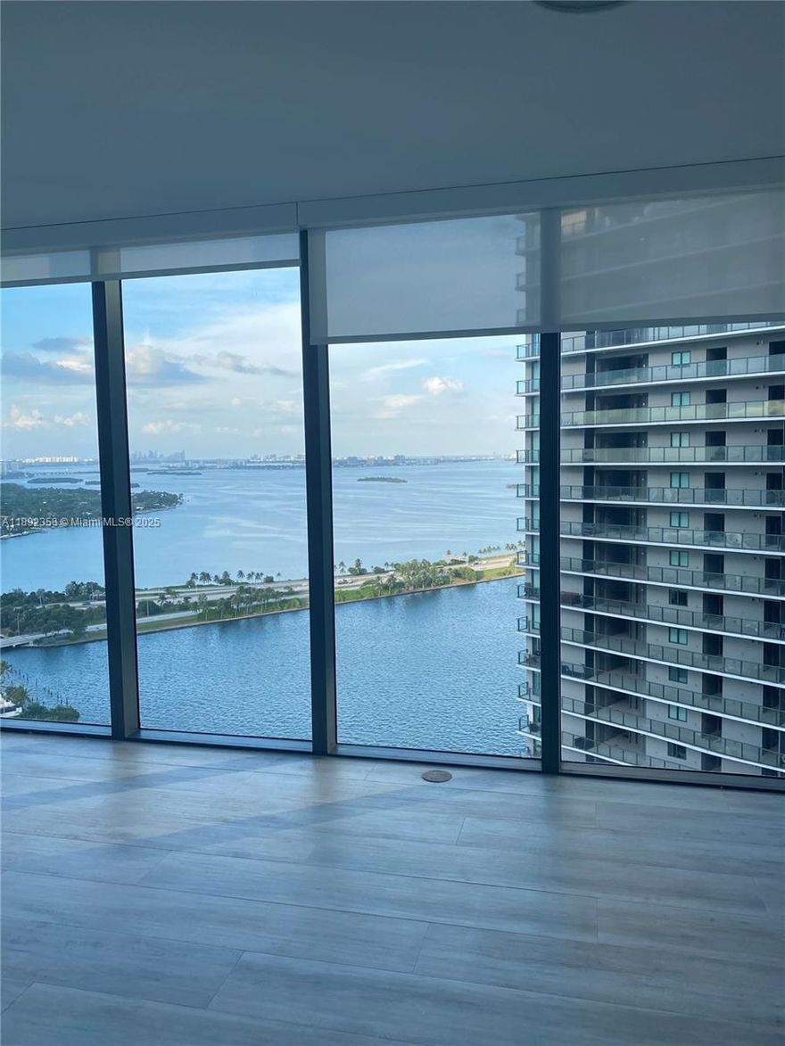 Amazing 1 Bedroom 1-1/2 Bathroom Condo on the 31st floor, corner unit, views of the Bay and the City.  The apt. has floor to ceiling glass, terrace, and eat in kitchen.The building contains a High level of amenities , including 24 hr valet parking, billiard room, gym, theatre, cigar lounge, tennis, access to Amara Restaurant and great location.  It also has semi private elevator entry foyer.  Easy to show, call listing agent.