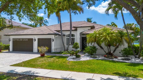 Photo of 5063 Sweetwater Ter, Cooper City, FL 33330 (MLS # A12016676)