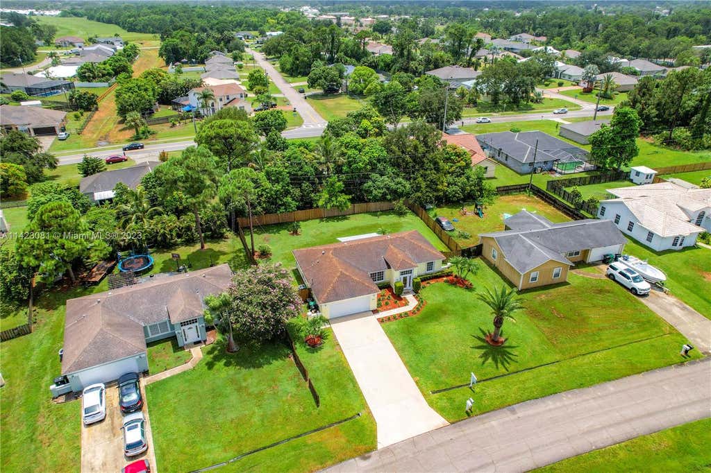 Photo of 758 SW Parker Ave, Port Saint Lucie, FL 34953 (MLS # A11423081)