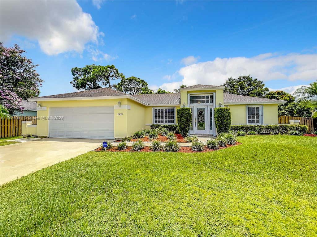 Photo of 758 SW Parker Ave, Port Saint Lucie, FL 34953 (MLS # A11423081)