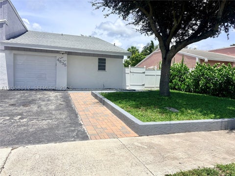 Photo of 4835 NW 6th Ct, Delray Beach, FL 33445 (MLS # A12068012)