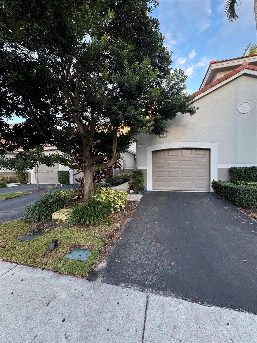 Beautifully maintained 3-bedroom, 2.5-bathroom townhouse with a serene water view in the desirable community of San Simeon, Weston.  This spacious home features an updated kitchen with stainless steel appliances and abundant natural light. Tile flooring on the main level and wood floors upstairs. Includes a covered one-car garage plus additional driveway parking and in-unit washer and dryer.  Community amenities include a pool, and playground.  
 Association approval is required.