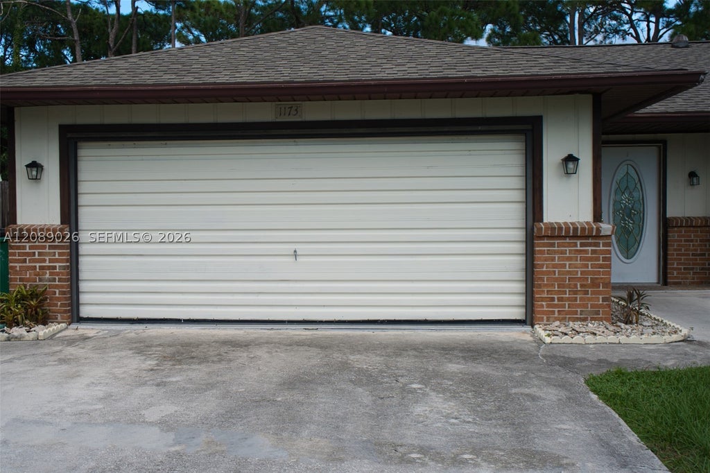 Photo of 1173 SE Odonnell Ln, Port St Lucie, FL 34983 (MLS # A12089026)
