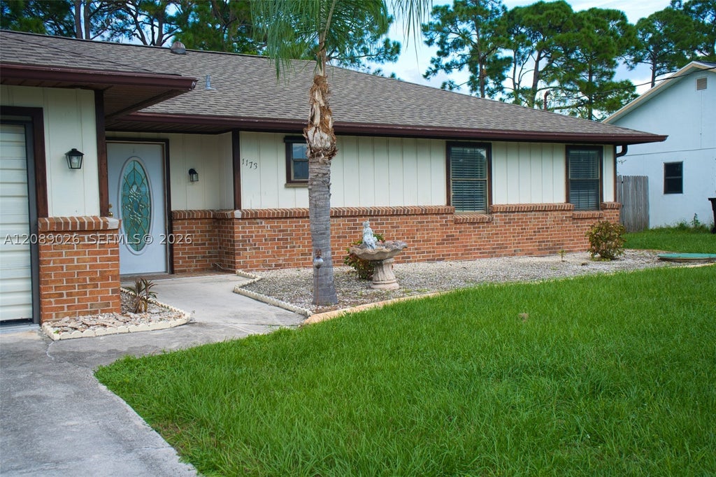 Photo of 1173 SE Odonnell Ln, Port St Lucie, FL 34983 (MLS # A12089026)