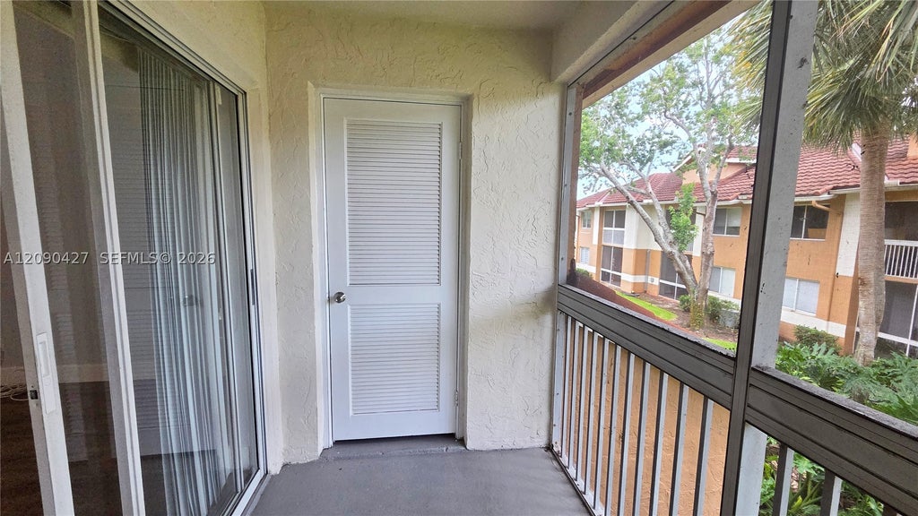 Photo of 832 NW 92nd Ave #932, Plantation, FL 33324 (MLS # A12090427)