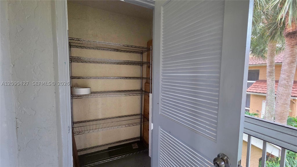 Photo of 832 NW 92nd Ave #932, Plantation, FL 33324 (MLS # A12090427)