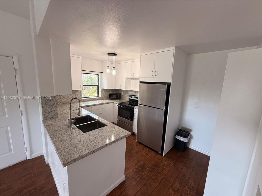 Discover The Preserve at Avery Lakes, a welcoming and family-friendly community. This bright corner unit offers a modern, renovated kitchen with new appliances, granite countertops, and a refreshed bathroom. The layout includes generous walk-in closets, a full-size washer and dryer, and a newly installed A/C system  Relax on the screened balcony with serene water views and enjoy easy access to nearby walking paths. Residents have access to excellent amenities such as a swimming pool, fitness center, clubhouse, and playground. Water is included in the rent. The unit includes one assigned parking space along with plenty of guest parking.