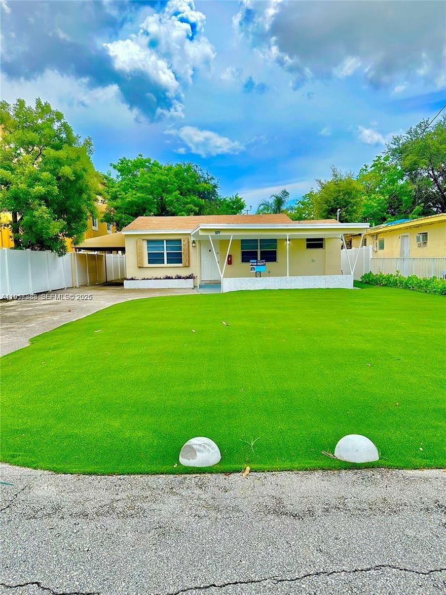 SELLER FINANCING AVAILABLE! JUST RENOVATED! Updated 4 bedroom, 2 bathroom HOUSE the home has a large carport and big front yard NEW TURF LAWN front and back.. Inside is Vinyl wood flooring throughout, The kitchen has granite countertops, wood cabinets, and stainless steel appliances, including a stove/oven, dishwasher, microwave and refrigerator. Laundry room next to kitchen has washer/dryer. The new bathrooms have a modern sink, faucet, and vanities. Its central a/c but two other rooms use a split and a wall unit. In the back has an Open Patio. Small storage shed / build in the backyard.  VERY Close to i-95 for easy commuting, near hallandale blvd for shopping convenience, and close to beach