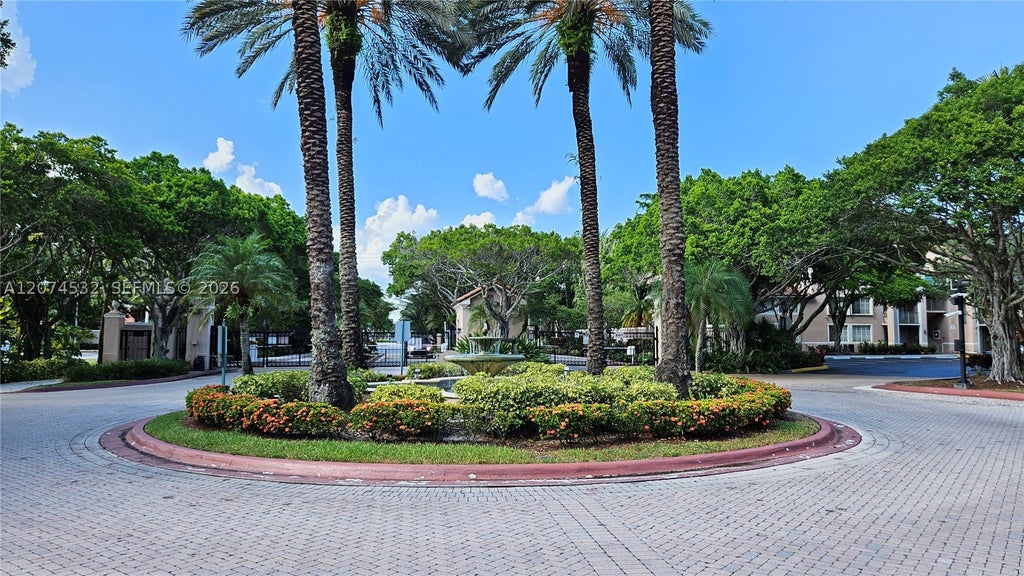 Photo of 12112 Saint Andrews Pl #309, Miramar, FL 33025 (MLS # A12074532)