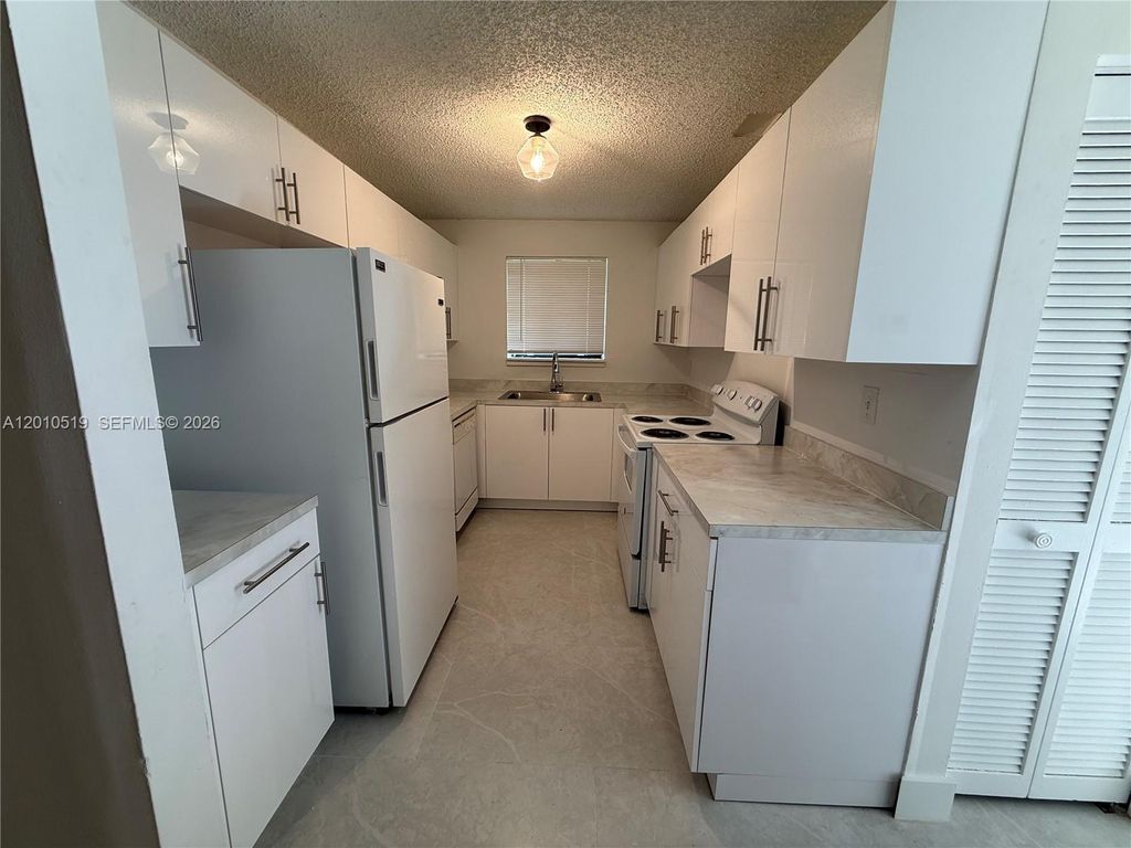 Photo of 3548 NW 111th Ter, Sunrise, FL 33351 (MLS # A12010519)