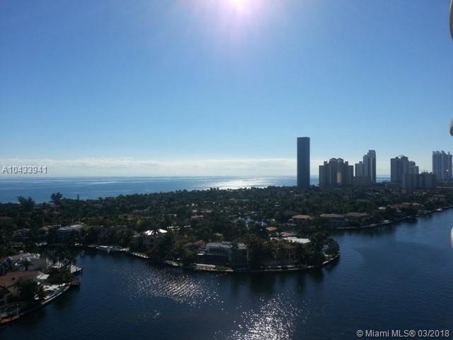 Stunning DIRECT OCEAN VIEW residence in one of South Florida's most prestigious buildings. 2 bedrooms + Den + Home Office, marble floors, crown moldings, state of the art kitchen and direct east views. unit is flow through so you also have stunning Turnberry Golf views. Located directly on country club drive, enjoy the area's best shopping, dining, beaches, parks entertainment and A rated schools. Building offers, tennis, restaurant, coffee shop, pool, outdoor playground, indoor playroom, billiards and gym!! Just steps away from sunny isles !!!