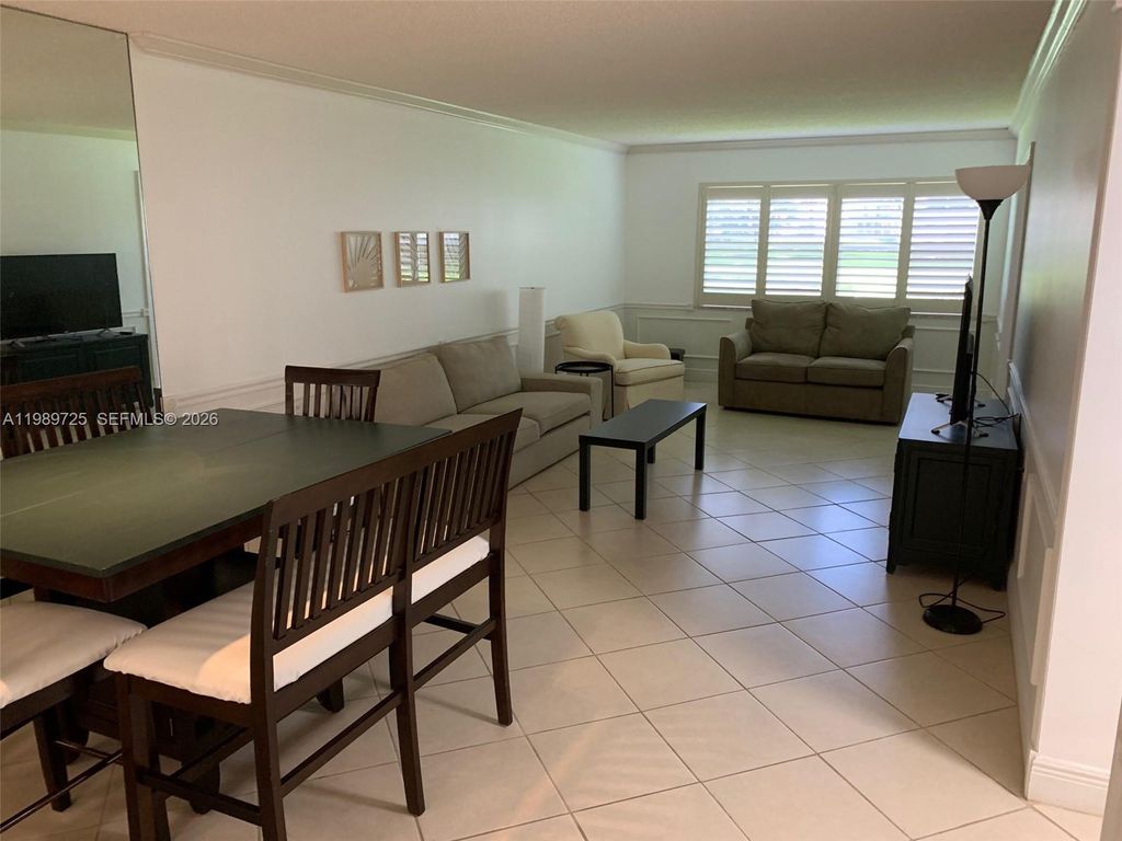 Photo of 4801 Martinique Pl #H1, Coconut Creek, FL 33066 (MLS # A11989725)