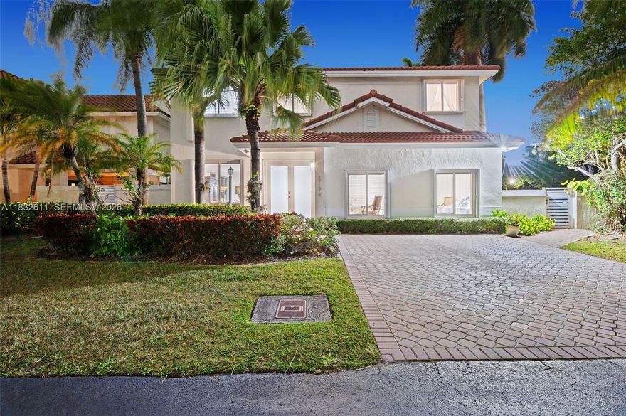 January 2026: NEW Roof + NEW Impact Windows & Doors. Discover Doral Glen Living! Clubhouse socializing, a giant swimming pool, indoor/outdoor dining & cocktails, a lakeside gym, professional hosting of your special events – all this & more await. The stylish home at the attractive end of a no-thru street overlooks a wide canal bordering a golf course. Spacious formal & casual wings + a large fenced yard with a covered patio give you the flexibility to host both casual and elegant affairs. The impressive kitchen is appointed with rich wood cabinetry, granite counters, S/S appliances, and extensive storage. Bedrooms are split between upstairs (with a broad golf-view balcony) and downstairs, ideal for family privacy while housing guests or staff. Call for a tour of the home and community!