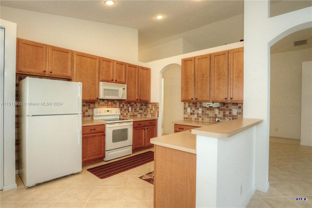 Photo of 1485 SE Legacy Cove Cir, Stuart, FL 34997 (MLS # A11511900)