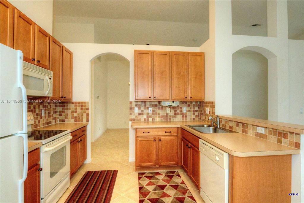 Photo of 1485 SE Legacy Cove Cir, Stuart, FL 34997 (MLS # A11511900)