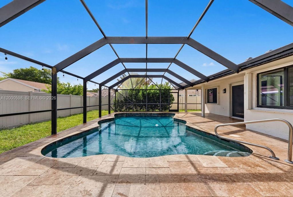 Photo of 14711 Kirsten Ct, Davie, FL 33325 (MLS # A12000598)