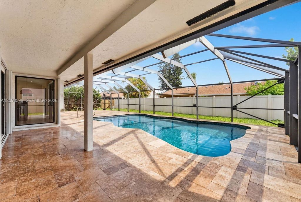 Photo of 14711 Kirsten Ct, Davie, FL 33325 (MLS # A12000598)