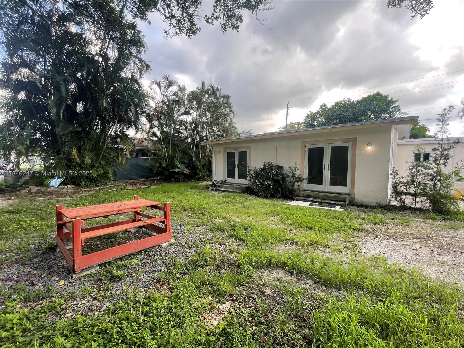 This unique property is containing a main house with large 2 Beds, 2 Bath and an inlaw unit with 1 Bedrooom and 1 Bath to be rented seperatley. New roof, new fresh paint all around, porceline floor, impact windows and doors, and lots of parking. huge lot, lots of trees and storage areas. Close to all magore roads, Hard rock and Dania Point.