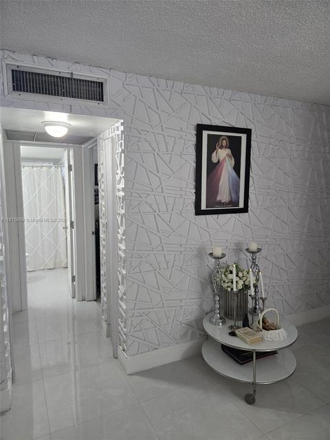 Photo of 9410 Live Oak Pl #103, Davie, FL 33324 (MLS # A11875809)
