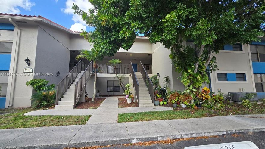 This charming 3-bedroom, 2-bathroom first-floor condo boasts a covered patio with peaceful lake views, a spacious living area, and a kitchen featuring granite countertops and wood cabinets. The condo also includes tiled floors in common areas and new vinyl high traffic flooring in the bedrooms. Located in the desirable Palm Beach Place Condo community, residents enjoy access to amenities such as a pool, fitness center, and tennis court. Ideally positioned just 5 miles from Okeeheelee Park, 6 miles from the Mall at Wellington Green, 6 miles from Palm Beach International Airport,. Plus, grocery stores, shops, dining, and entertainment are all within a mile. Investor-friendly, with the option to rent immediately. A must-see!