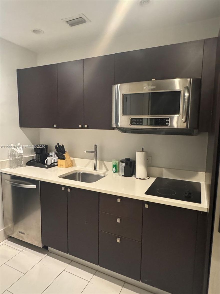 Fully Furnished Studio. Currently in Provident's hotel program. Features a bathroom with double vanity shower. Jacuzzi. Fully Equipped Kitchenette. Massage and Beauty Services Spa. 24 hrs. Fitness Center. Excellent Restaurant. Pool on site. Located in the second building next to the pool. Condo Association fees cover all amenities (electricity/hot water/basic cable, WIFI.)
Waling Distance to Downtown Doral and Trump National. 
Unit can be rented daily independently or through Hotel program. Owner can stay for up to six months per year.