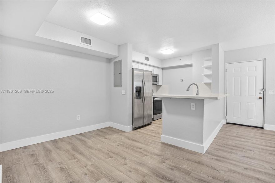 Beautifully updated 2-bedroom, 2-bath condo in the gated community of Vista Trace! This spacious second-floor unit features an open layout with plenty of natural light, modern flooring, and a renovated kitchen with stainless steel appliances and ample cabinet space. The primary suite includes a walk-in closet and private bath. Enjoy the convenience of an in-unit washer and dryer, a private balcony, and assigned parking. Community amenities include a pool, clubhouse, and playground. Conveniently located near shopping, dining, schools, and major highways. Move-in ready and easy to show!