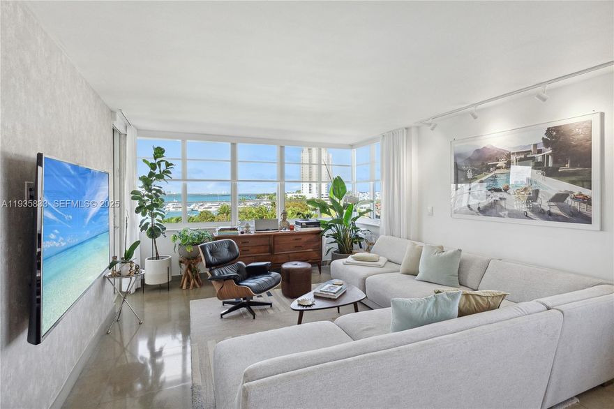 Discover this stunning top floor designer unit in a boutique waterfront building next to Sunset Harbour, nestled at the end of a quiet cul de sac near the Venetian Islands, a rare income generating gem. Perched atop, it delivers unobstructed bay views for a serene daily backdrop, flooded with natural light and showcasing modern, elegant design with high end finishes throughout, including beautiful limestone flooring. The fully equipped kitchen features state of the art appliances and generous counter space, paired with a spacious, inviting bedroom and luxurious bathroom boasting sleek fixtures and a spacious shower. Embrace the laid back waterfront lifestyle ideal for personal enjoyment or rental income and don't miss your chance to claim this breathtaking apartment as your new home!