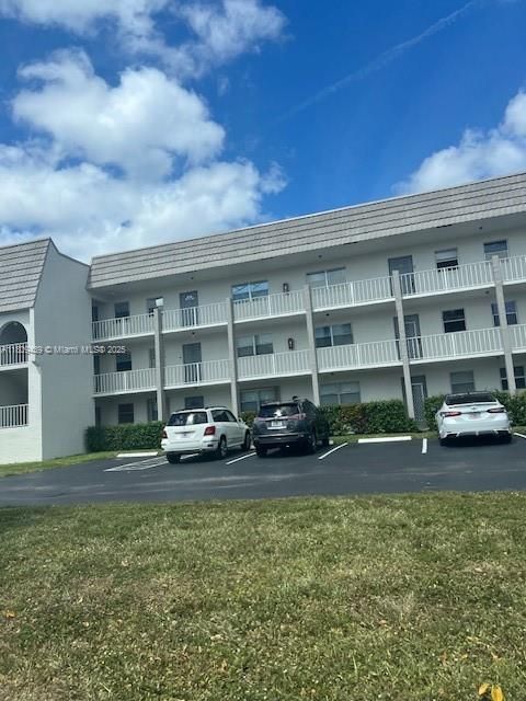 Photo of 8280 Sunrise Lakes Blvd #105, Sunrise, FL 33322 (MLS # A11809439)