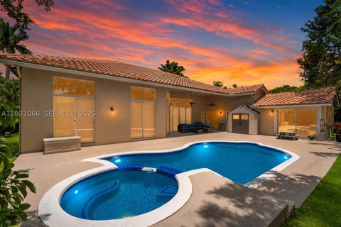 Photo of 1776 W Eagle Trace Blvd W, Coral Springs, FL 33071 (MLS # A12031066)