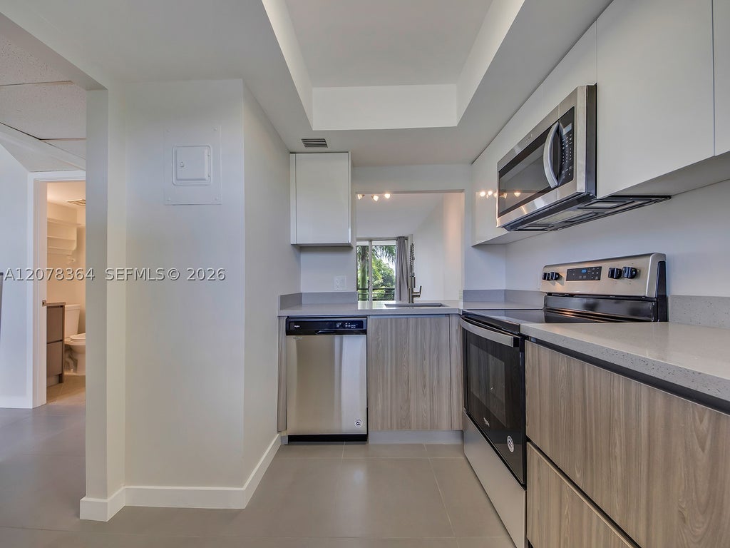 Photo of 108 Royal Park Dr #3G, Oakland Park, FL 33309 (MLS # A12078364)