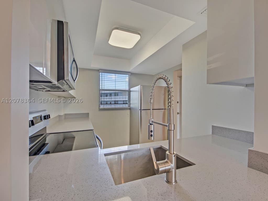 Photo of 108 Royal Park Dr #3G, Oakland Park, FL 33309 (MLS # A12078364)