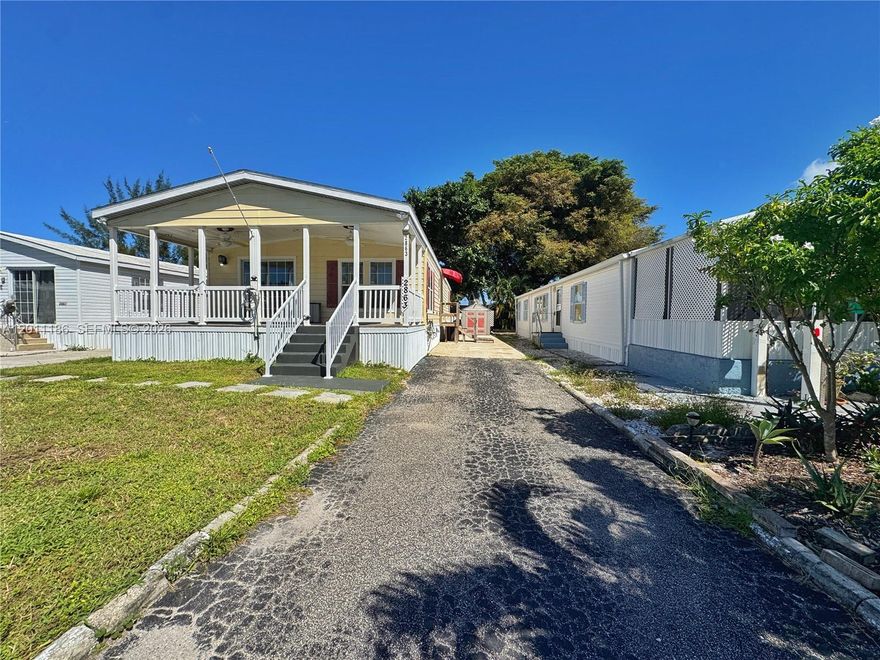 Beautifully updated mobile home with land included, offering modern upgrades and convenience in a prime location. Step into a brand-new kitchen featuring quartz countertops, wooden cabinets, Samsung appliances (all under warranty), Wi-Fi fridge, stove, dishwasher, microwave, and food disposal. Enjoy new wood laminate floors, LED ceiling lamps, and no popcorn ceilings. Bathrooms are fairly remodeled for added comfort. The home includes hurricane shutters, wooden wall with electric chimney, spacious porch, and cement staircase. Laundry is a breeze with a brand-new washer and dryer under warranty. Outside, you’ll find two storage sheds and parking for up to 4 cars. Just two blocks from Stirling Rd and shopping plazas, with quick access to I-95, great functionality, and location.