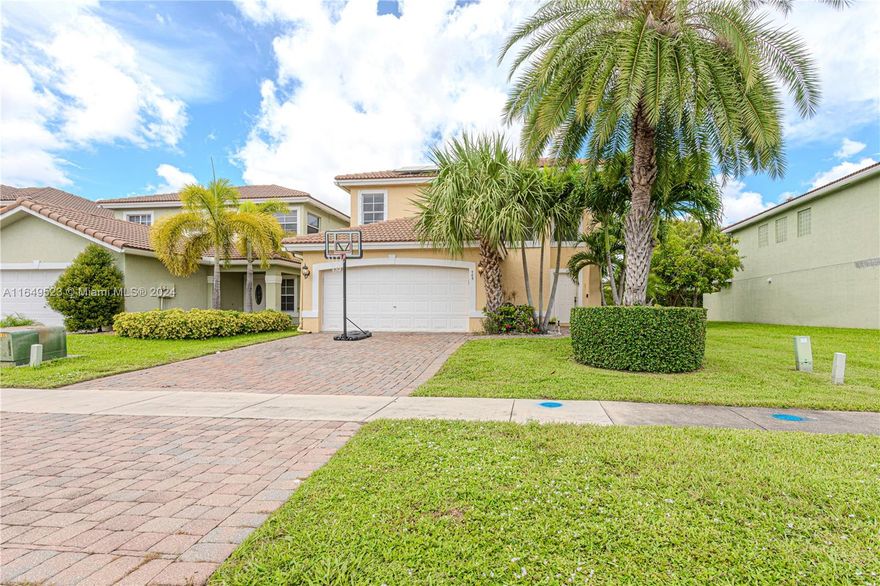 Charming 3 bedroom 2 1/2 bath home with plenty of space for entertaining in a beautiful, gated community.  This home boasts a living room and separate family room.  The spacious open concept kitchen is perfect for family gatherings.  Separate dining area is also a plus!  Outdoor patio and lush landscaping are just a few of the many reasons to call this place home!!    Community Pool and Tennis Court is also a fantastic feature in this development of Independence Point.   Close to major highways and Palm Beach International Airport.