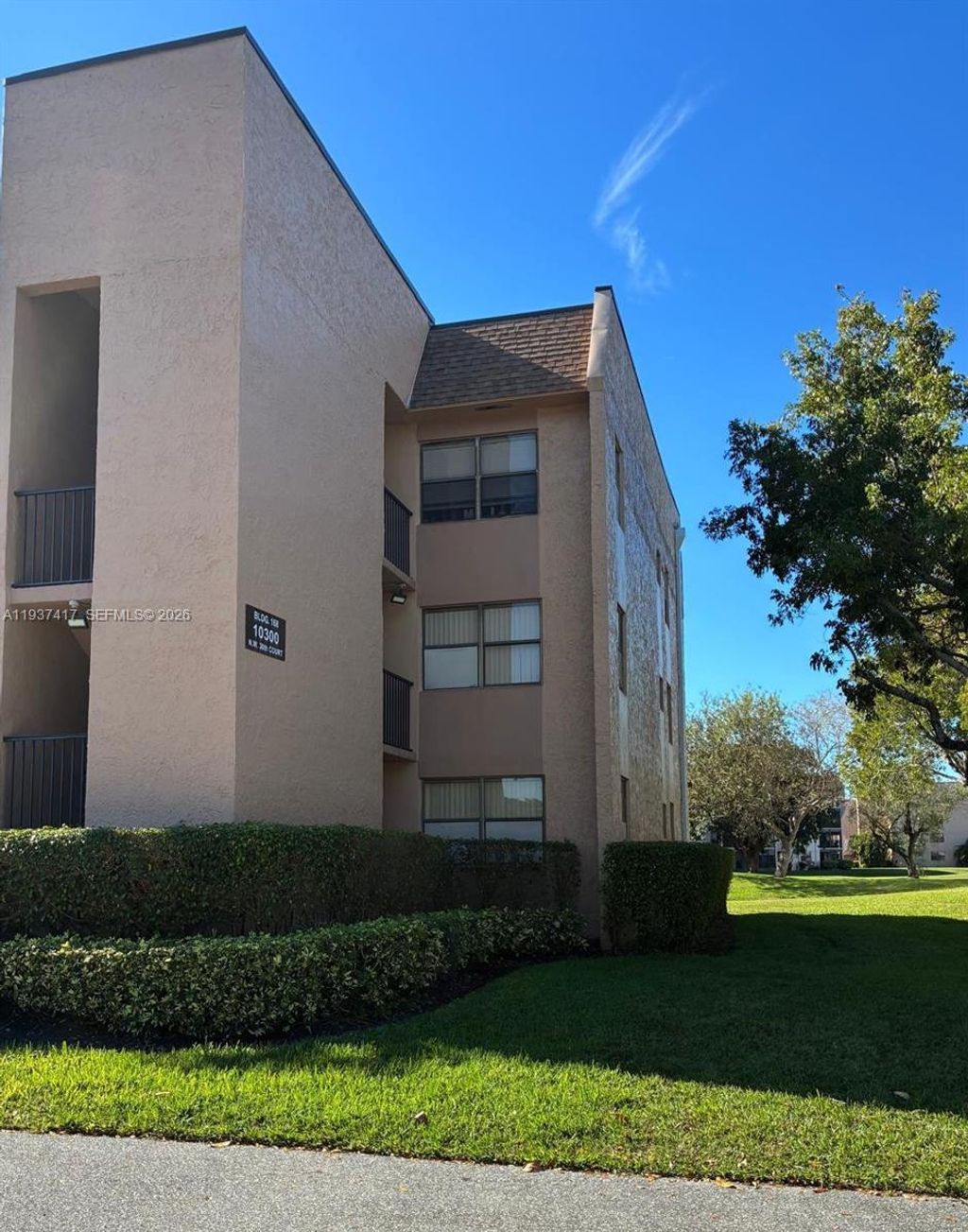 Photo of 10300 NW 30th Ct #210, Sunrise, FL 33322 (MLS # A11937417)