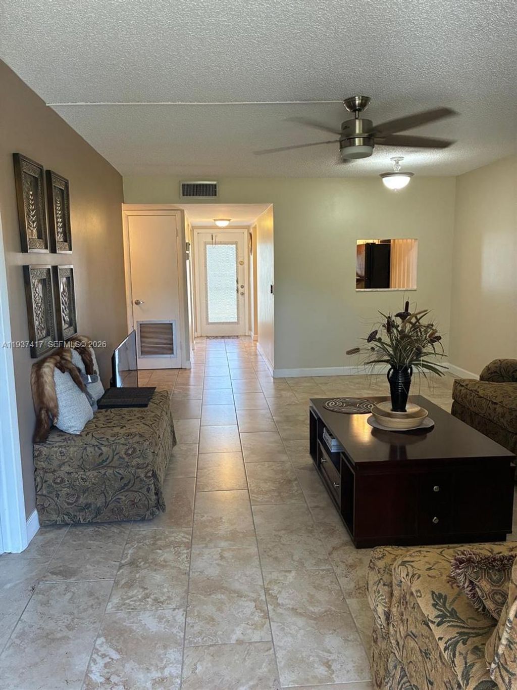 Photo of 10300 NW 30th Ct #210, Sunrise, FL 33322 (MLS # A11937417)