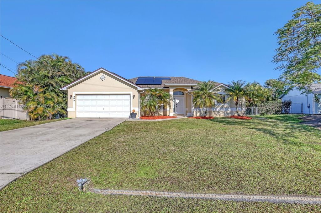 Photo of 1209 SW Glastonberry Ave, Port Saint Lucie, FL 34953 (MLS # A11766126)