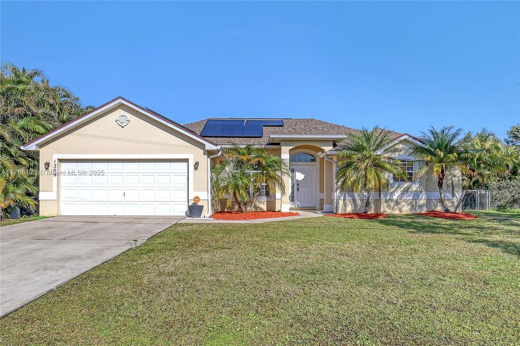 Photo of 1209 SW Glastonberry Ave, Port Saint Lucie, FL 34953 (MLS # A11766126)