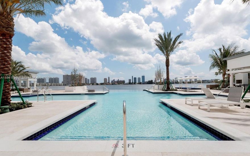 Step into a luxurious waterfront residence with two bedrooms and two bathrooms, all nestled in a spacious and open floor plan with high ceilings. The floor-to-ceiling windows offer breathtaking panoramic views of the marina and the surrounding areas. The kitchen boasts high-end finishes, including imported Italian cabinetry, quartz countertops, and top-of-the-line Sub-Zero and Wolf appliances. Step outside onto your private terrace, complete with glass railings, ample walk-in closets, and sound-insulated walls. This exquisite property is conveniently situated near the Aventura Mall, Sunny Isles Beach, and Bal Harbour Shops.
