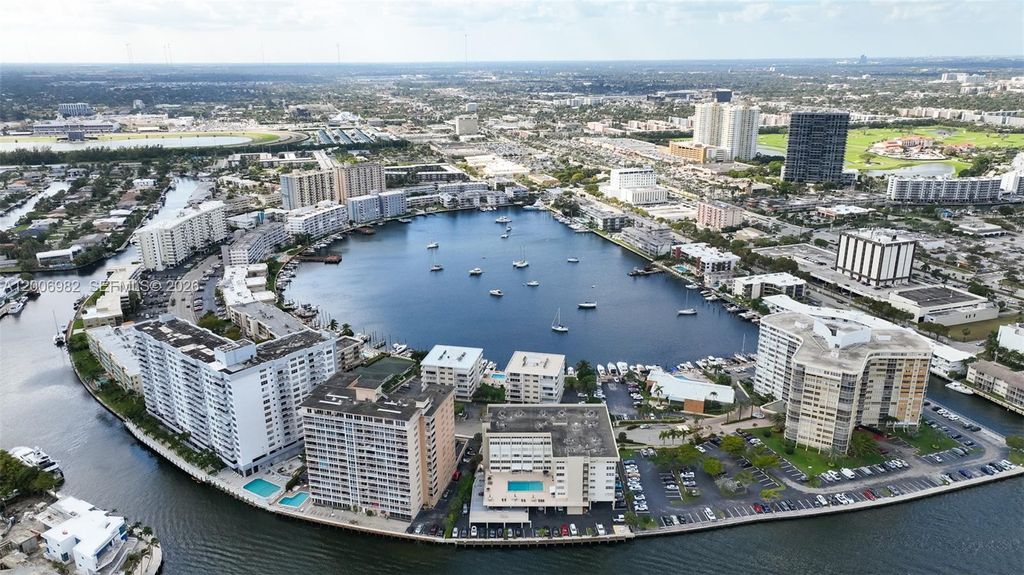 Photo of 427 Golden Isles Dr #7J, Hallandale Beach, FL 33009 (MLS # A12006982)