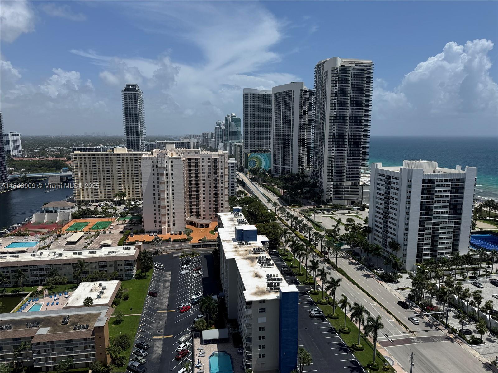 Resort-style condo with stunning beach and Intracoastal views in a prime location! This modern high-rise is just steps away from a quiet stretch of pristine white sand beach. Featuring style and comfort, it offers an Italian kitchen with stainless steel appliances, granite countertops, and quality cabinetry. Floor-to-ceiling windows brighten the living and bedroom spaces, which include a spacious closet and bathroom. The den doubles as a second bedroom or office. Enjoy the convenience of an in-unit washer and dryer. Nearby is Aventura Mall Gulfstream Park horse racing, the Hard Rock Casino-Hotel, and golf at the Diplomat Country Club. Amenities include an Intracoastal infinity pool, state-of-the-art fitness center, hot tub, conference room, club room, 24-hour front desk, and valet parking.