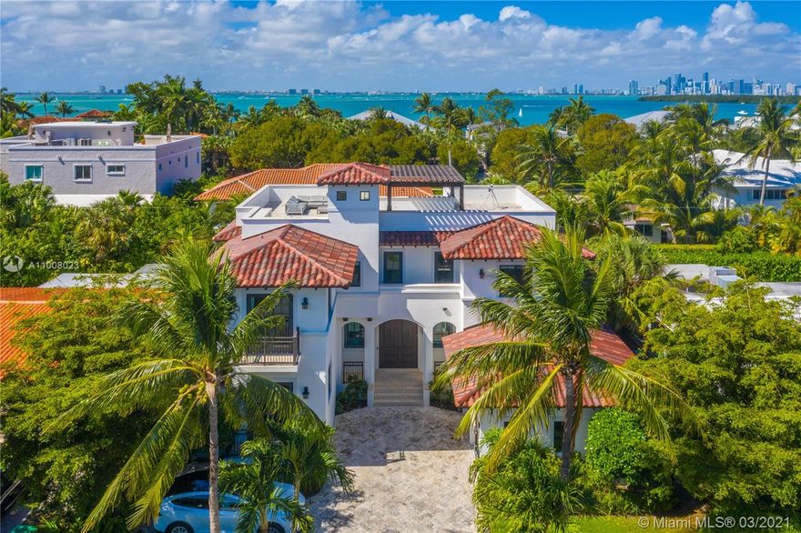 Impeccable 3 story home with an abundance of luxury amenities and 360 degree panoramic roof deck with stunning water views. Home custom built by existing owner. This open and bright residence, with its timeless transitional design, balances old and new, from its 100+ year old FSC certified solid reclaimed wood floors to its fully modern bathrooms and chef’s kitchen equipped with top of the line appliances and fixtures. Private outdoor oasis with large summer kitchen, 50 ft saltwater pool, large sun shelf, rock climbing wall and kids play area. Enjoy a movie on a 123” retractable screen as your living room transforms into a home theater complete with a 4K cinema projector, surround sound and motorized shades..  Gross FAR, including 2 car garage, is 5,967 sq ft per architectural plans.