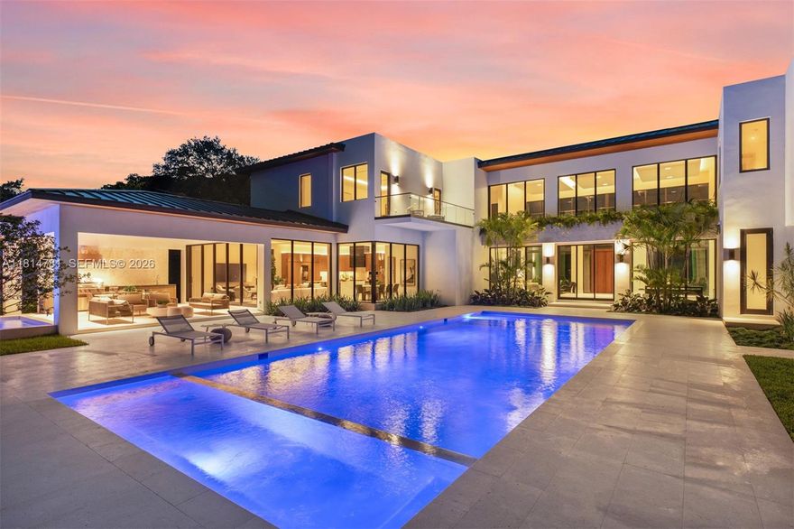 This brand-new transitional masterpiece in the heart of Pinecrest exudes sophistication and elegance. Boasting 8 bedrooms & 9.1 bathrooms across 11,375 SF, it features 2 primary suites, a home theater & a private home office. A separate guest house with a kitchenette adds flexibility for visitors or extended family. The gourmet kitchen is equipped with Subzero refrigeration, Wolf & Al Fresco appliances & custom wood cabinetry. Floor-to-ceiling windows flood the open living spaces with natural light & panoramic views. Enjoy seamless indoor-outdoor living with covered terraces, a heated pool & a summer kitchen. Smart home technology, Control4 automation, full house generator & elevator-ready design & premium finishes complete this rare opportunity to own a truly luxurious Pinecrest estate.