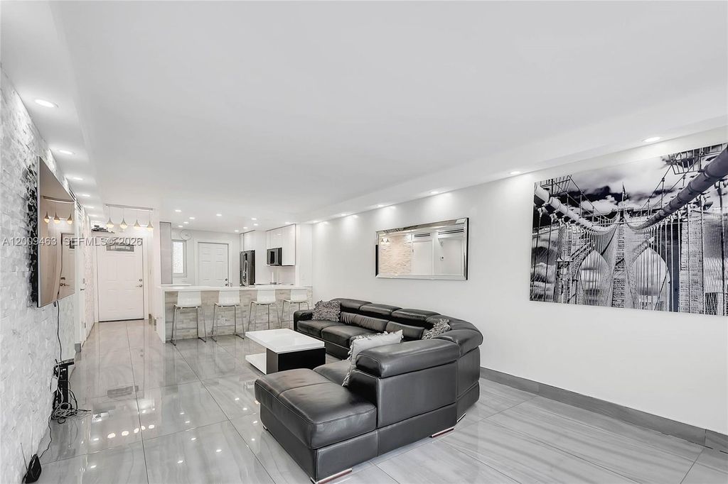 Photo of 5260 NW 11th St #201, Plantation, FL 33313 (MLS # A12009463)