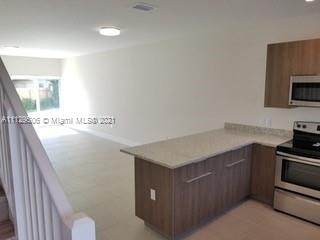 EAST OF 5TH TOWNHOMES - Residential Lease